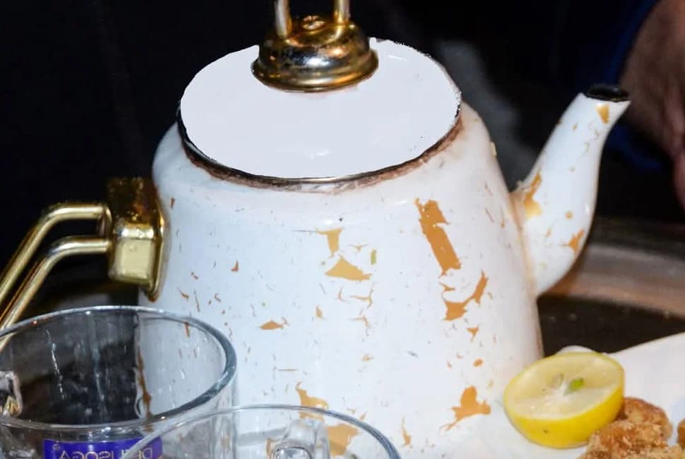 A teapot and glasses from Ghani Shinwari's Peshawari Kehwa photograph